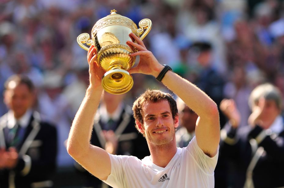 Andy Murray lifts the Wimbledon trophy to become the first British man to win the title since Fred Perry in 1936 following a straight sets win over Novak Djokovic.