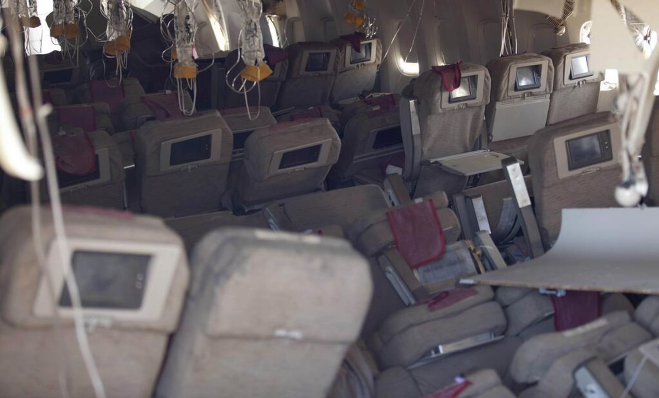 A photo showing the damaged interior of the aircraft was released by the NTSB on July 7. The flight carrying 291 passengers and 16 crew took off from Shanghai and stopped in Seoul before heading to San Francisco.