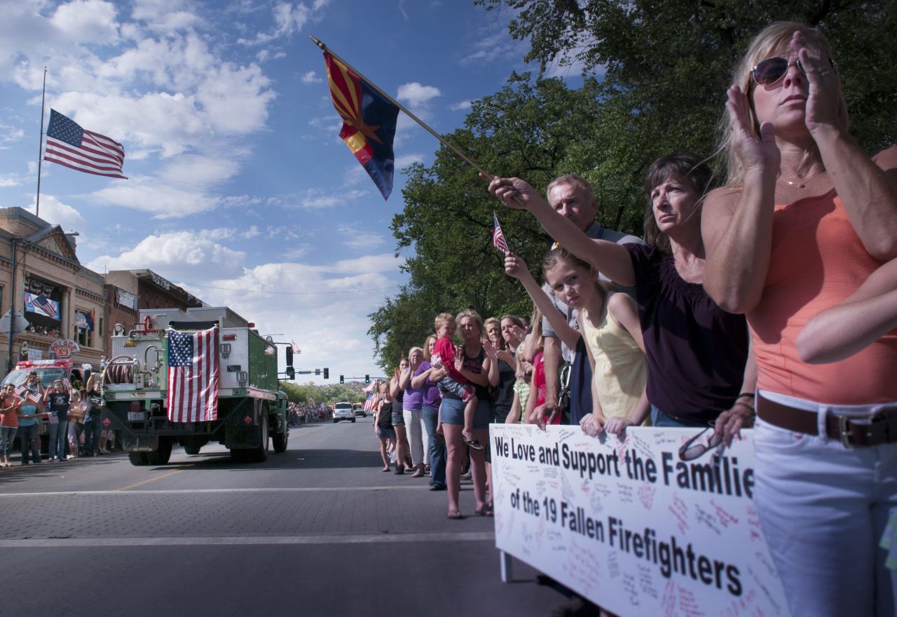 Citizens of Prescott, Arizona, welcome home the bodies of the 19 firefighters on Sunday, June 7. 