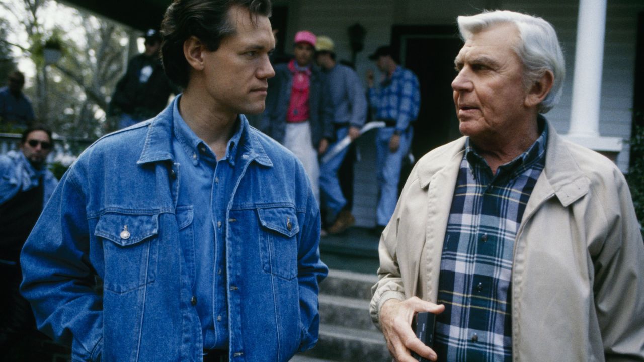 Travis talks with Andy Griffith on the set of "Matlock" circa 1993.