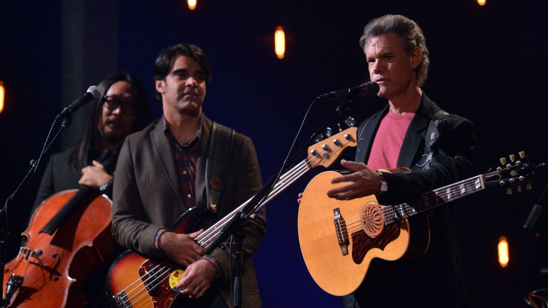 Travis performs with the Avett Brothers during a taping of "CMT Crossroads" in Franklin, Tennessee, on October 24, 2012.