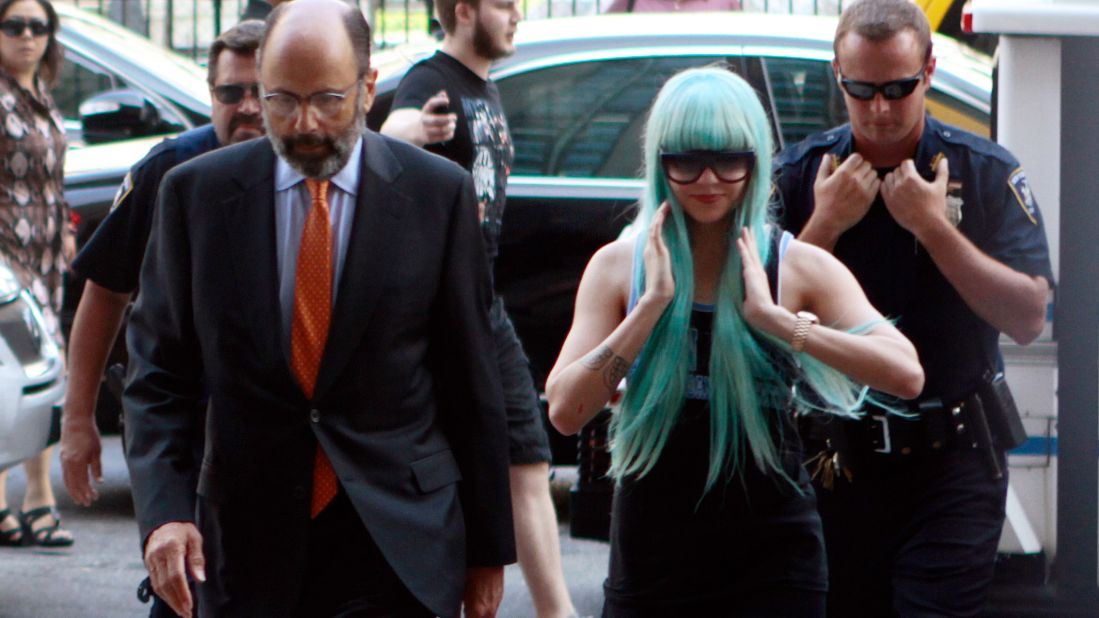 Bynes and attorney Gerald Shargel arrive for a court appearance in New York on July 9, 2013. She was charged with reckless endangerment and attempting to tamper with physical evidence. <a href="http://miami.cbslocal.com/2014/06/30/amanda-bynes-new-york-bong-tossing-case-dismissed/" target="_blank" target="_blank">The case was later dismissed. </a>