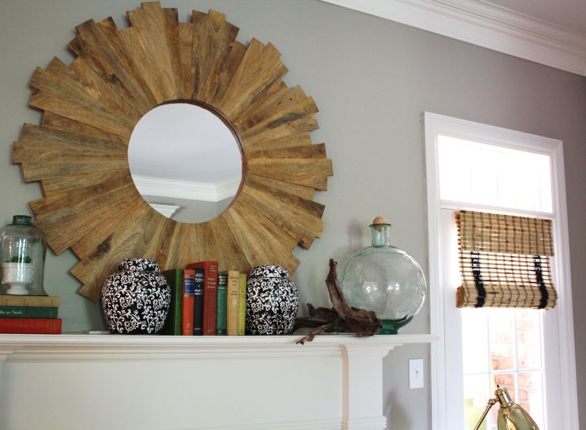 <a href="http://ireport.cnn.com/docs/DOC-1000676">Emily Clark</a> of Charlotte, North Carolina, mixed glass objects and driftwood to lend a summery feel to her mantel.