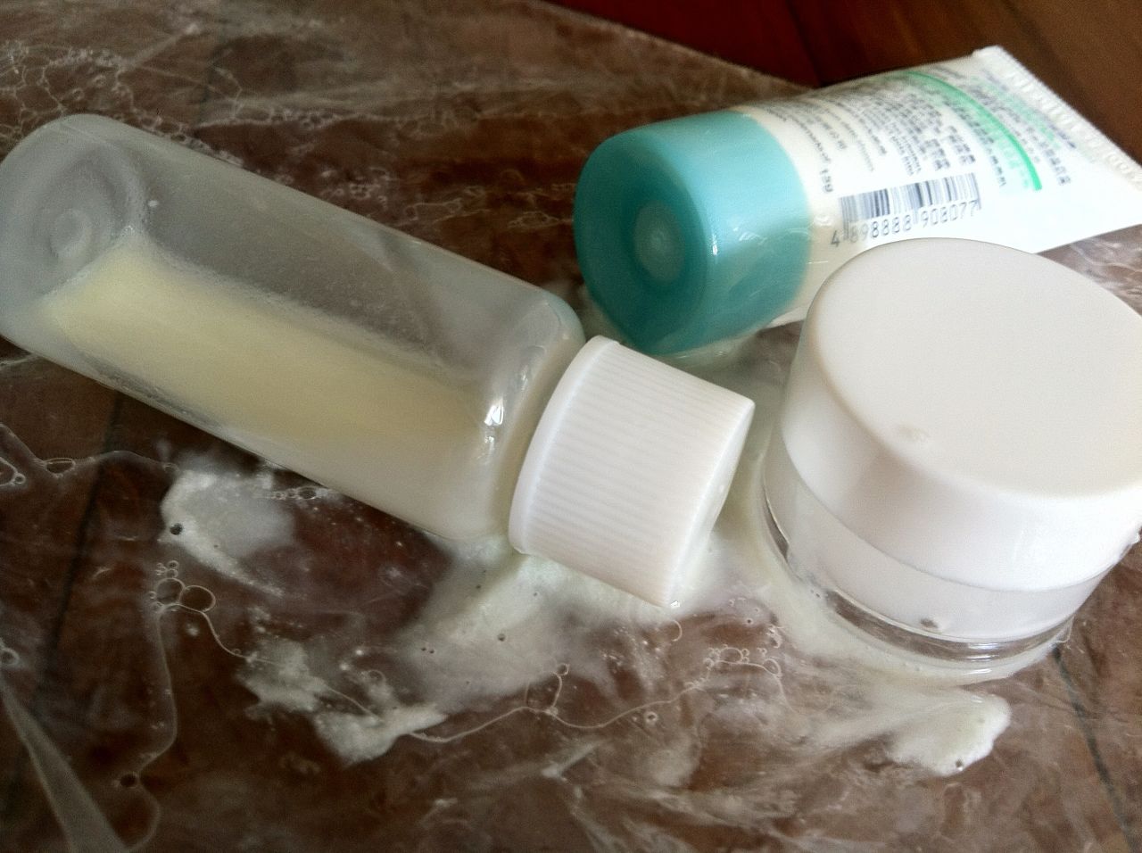 Trial-size shampoo bottles are handy -- until they burst open in-flight, spreading glycerol soap snot all over your bag. 