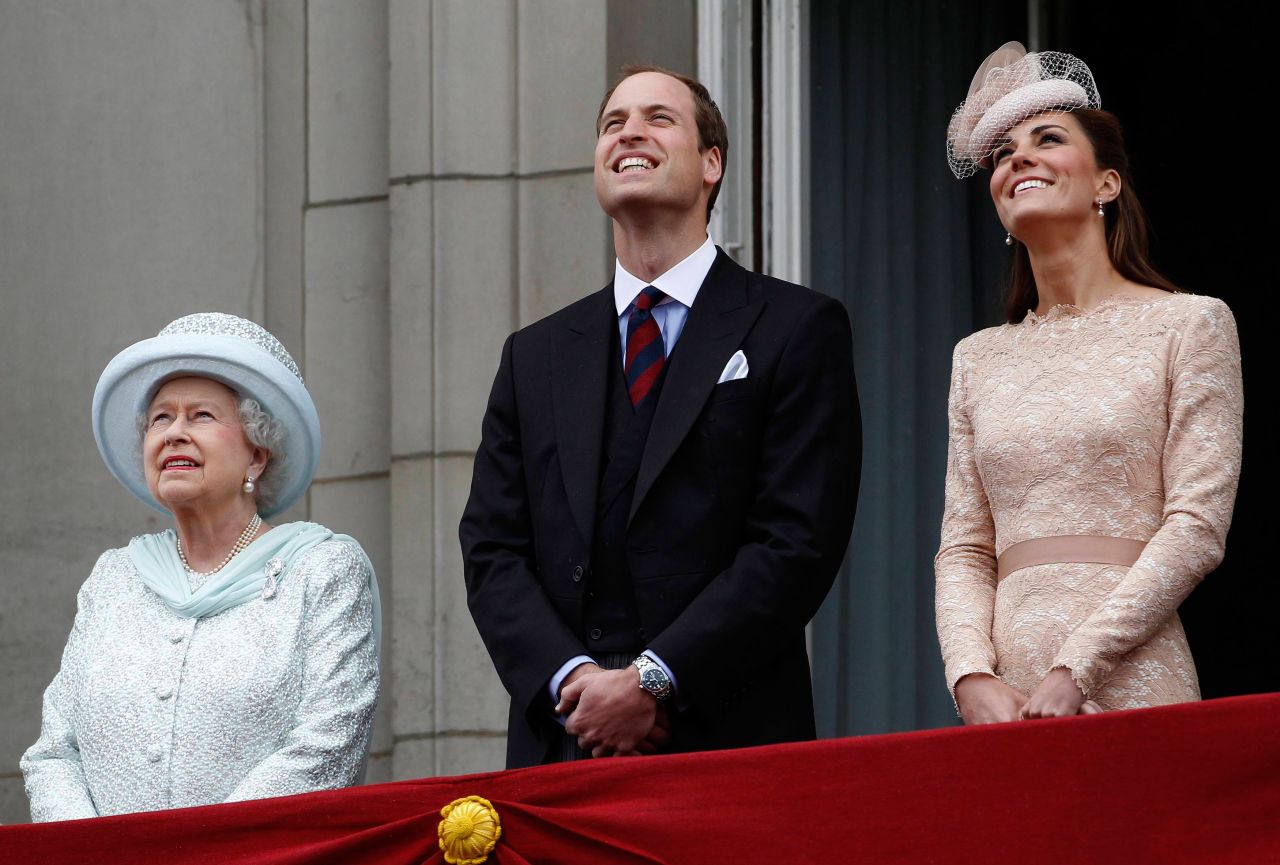 The Queen, William and Catherine stand on the balcony of Buckingham Palace during the finale of the Queen's Diamond Jubilee celebrations in June 2012.