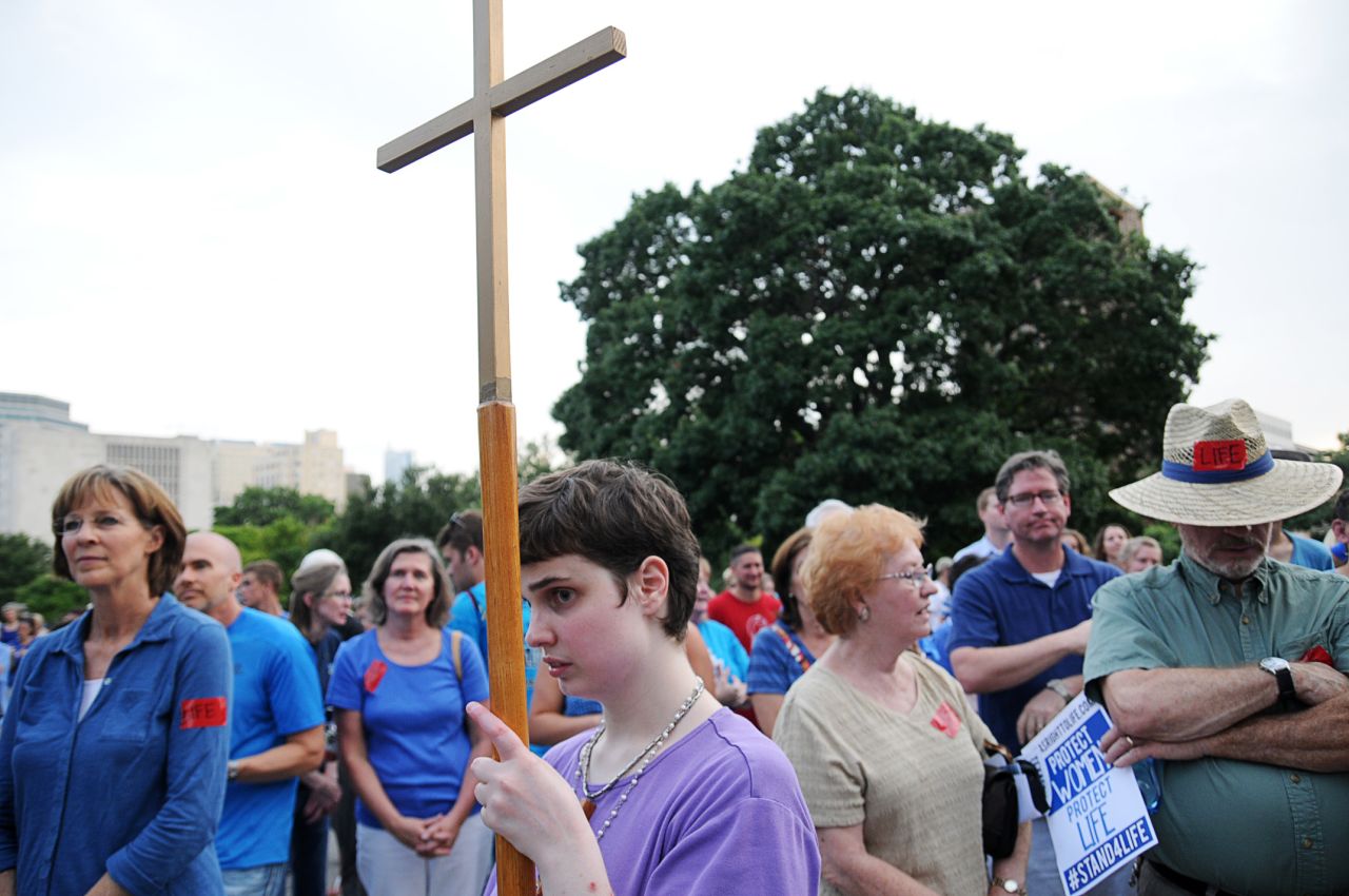 Supporters of an abortion bill listen to speakers at a July 2013 rally organized by the Texas Right to Life Organization.