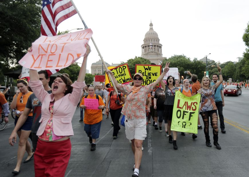 Abortion-rights activists march from the Capitol in July 2013.