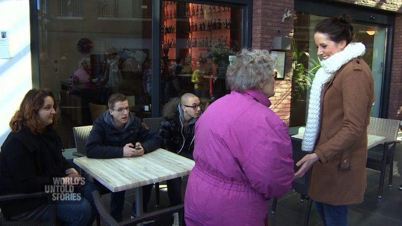 Other visitors spend time with their relatives in the courtyard village where carers and volunteers keep an eye on the residents.