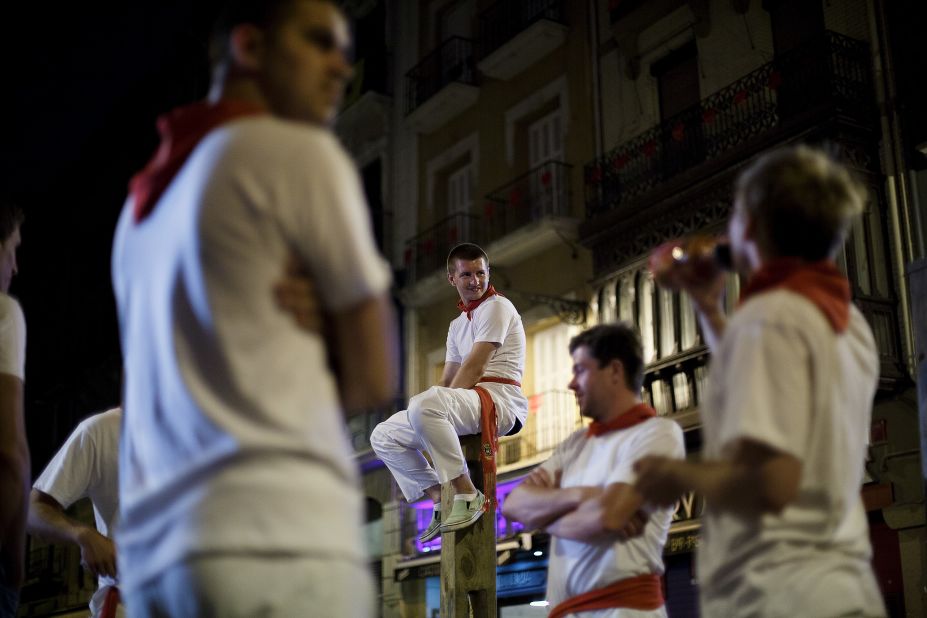 People gather on July 10 before the start of the fifth day of the running of the bulls.