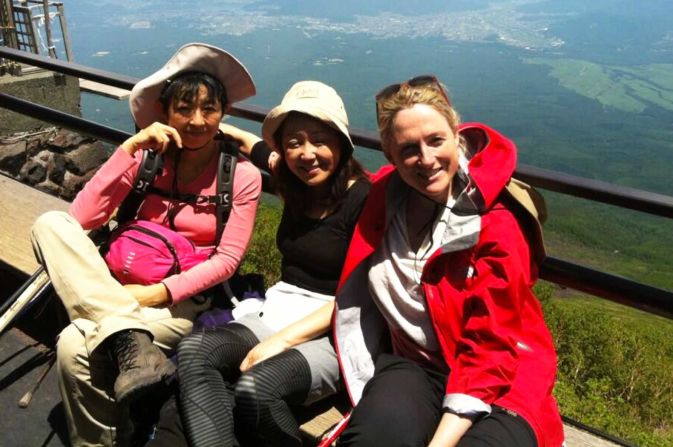 Team Tokyo rest at the first base station on the 3,776-meter peak. Each, year an estimated 300,000 people make the climb.