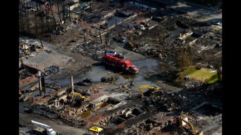 Firefighting vehicles from the United States helped Canadian authorities battle the blaze in Lac-Megantic, a town of about 6,000 people 130 miles east of Montreal. 