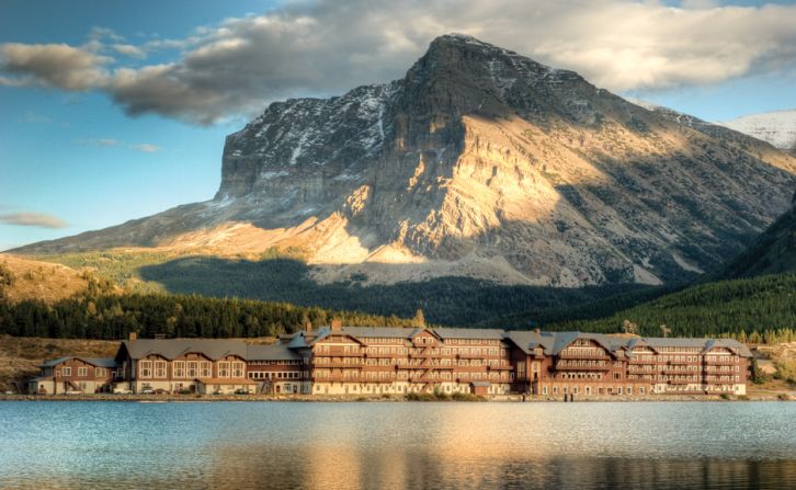 The Rocky Mountains surround Many Glacier Hotel in Montana's Glacier National Park.
