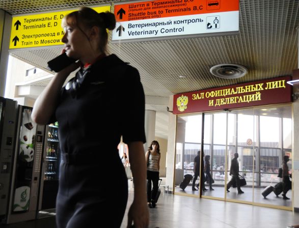 A Russian airline employee moves through Terminal F on July 6.