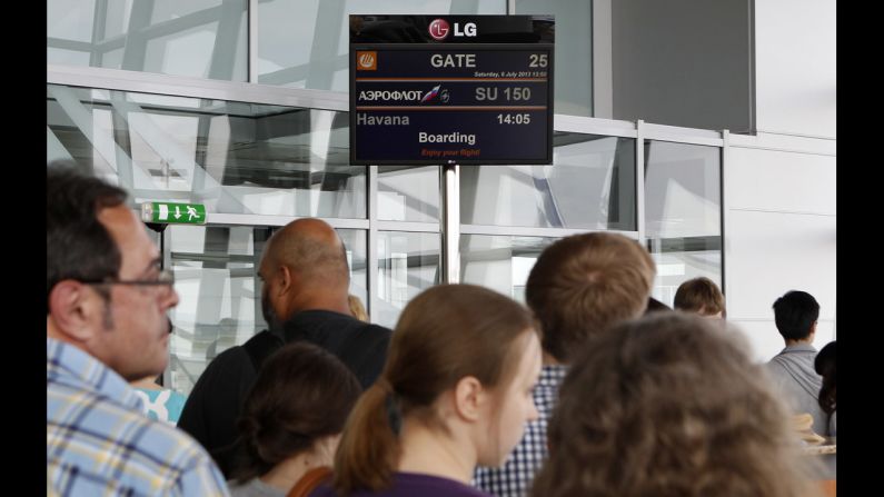 People line up before boarding an Aeroflot flight to Havana on July 6. Such a flight could offer connections to Venezuela.<a href="index.php?page=&url=http%3A%2F%2Fwww.cnn.com%2F2013%2F07%2F10%2Fworld%2Famericas%2Fnsa-snowden-venezuela%2Findex.html"> If Snowden accepts the leftist goverment's asylum offer</a>, he must figure out how to get there without passing through U.S. airspace or that of other nations friendly to the United States.