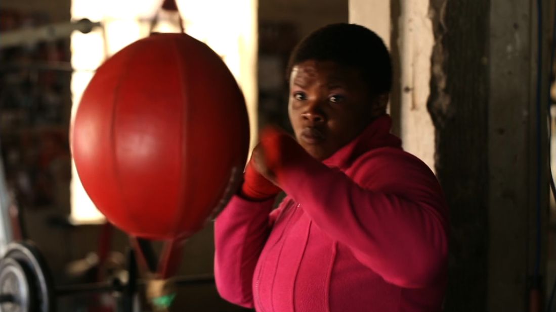Rita Mrwebi, the South African female welterweight champion, trains inside Hillbrow Boxing Club as she prepares for a big title match next month. 