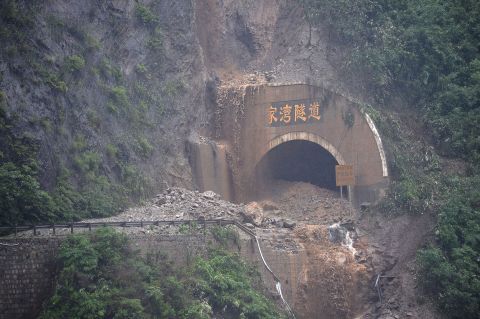 A road in Wenchuan county was destroyed by rain-triggered mudslides on July 10.