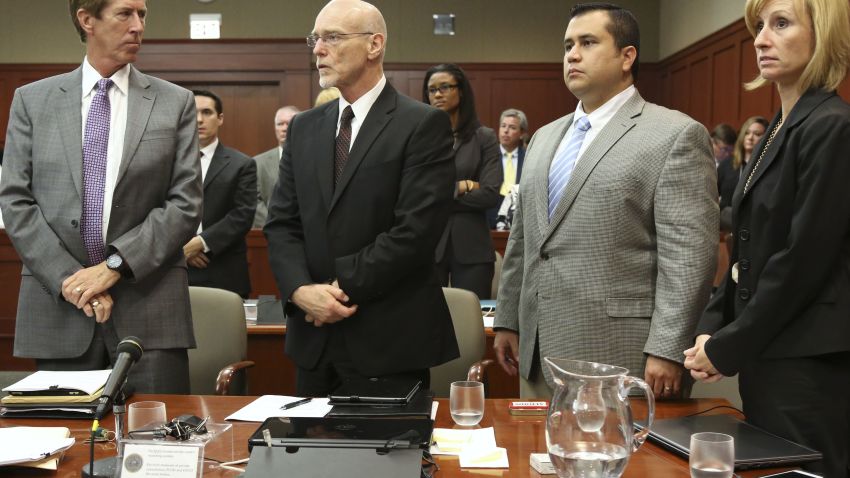 SANFORD, FL - JULY 11:  George Zimmerman stands with his defense team Mark O'Mara, (L), Don West, (Center L), and Lorna Truett during his trial in Seminole circuit court July 10, 2013 in Sanford, Florida. Judge Debra Nelson has ruled that the jury can also consider a manslaughter charge along with the second-degree murder charge in the shooting death of Trayvon Martin. (Photo by Gary W. Green-Pool/Getty Images)