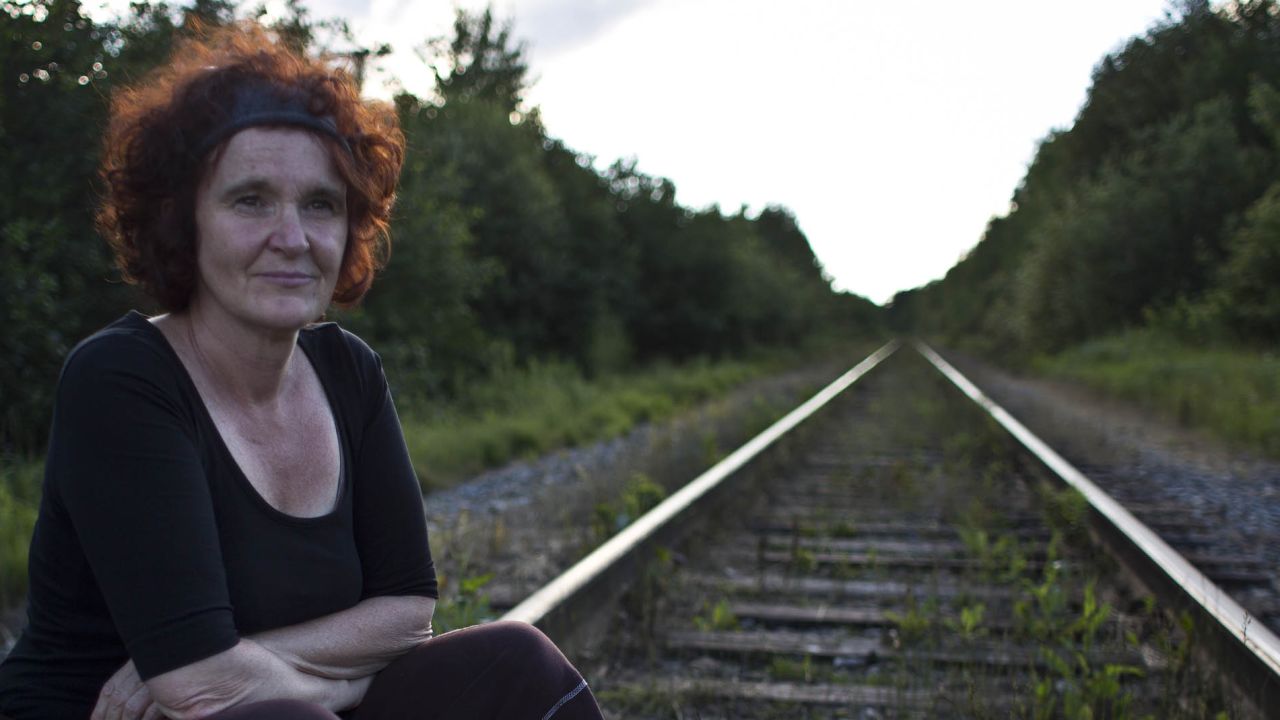 Luce Robineau, on the train tracks directly behind her home, lost her business in the derailment. She operated a boutique downtown and hopes to rebuild. 