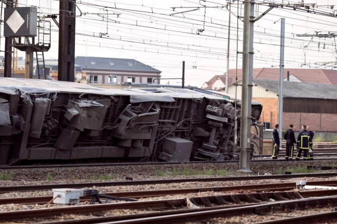 A car from the train is seen on its side after the accident on July 12. 