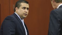 George Zimmerman speaks to his attorney Mark O'Mara after the jury left to deliberate during his trial in Seminole Circuit Court in Sanford, Florida. Friday, July 12.