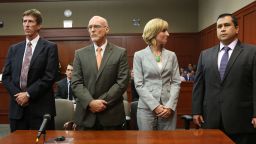 George Zimmerman listens with his defense team as the not guilty verdict is read on July 13.
