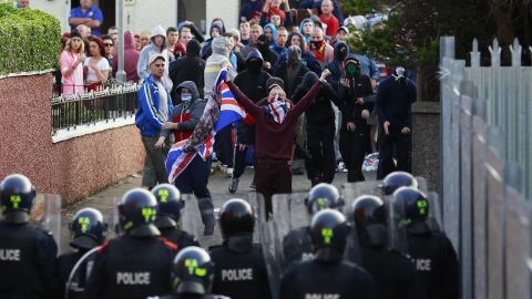 Northern Irish loyalists clash with police in Belfast, Northern Ireland, on Saturday, July 13, a day after protests broke out because a Protestant Orange Order parade was blocked from marching past the predominantly Catholic and nationalist Ardoyne area.