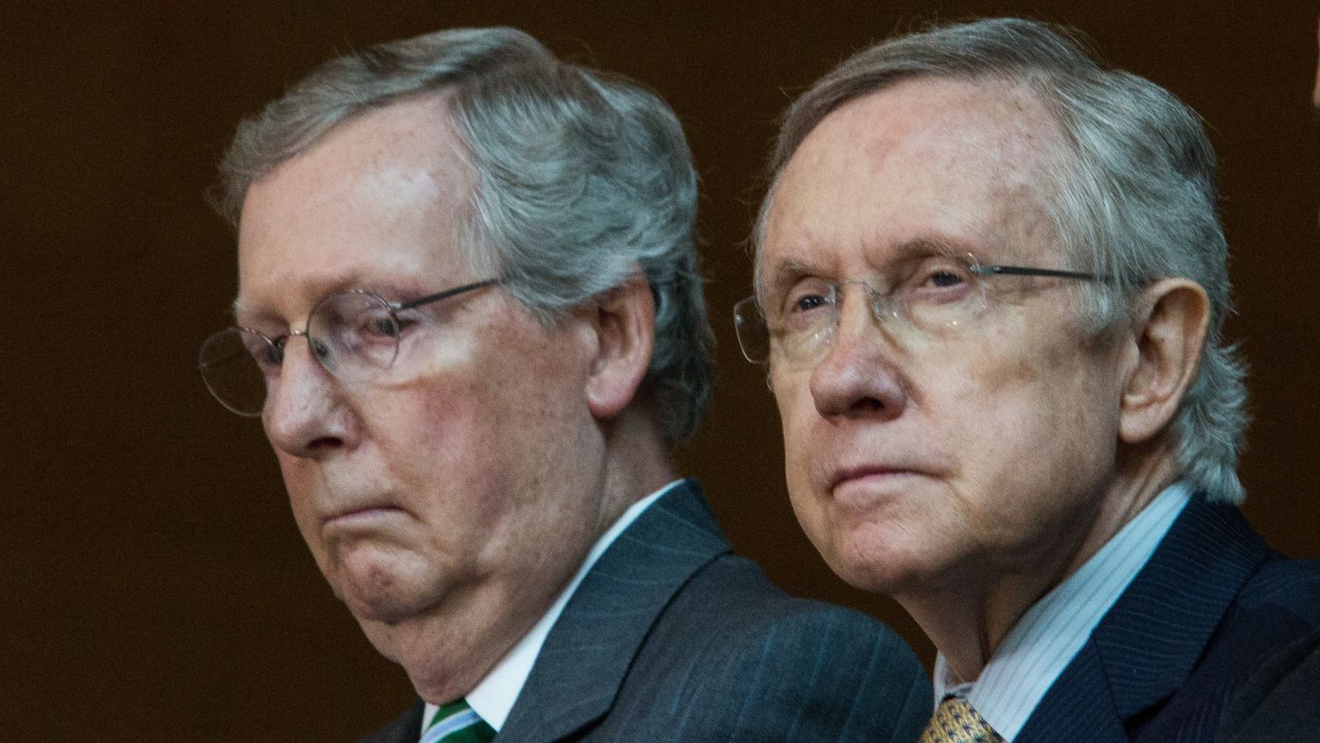 Sen. Mitch McConnell, left, said that if Harry Reid didn't back down from his threat, he would be the worst majority leader ever.