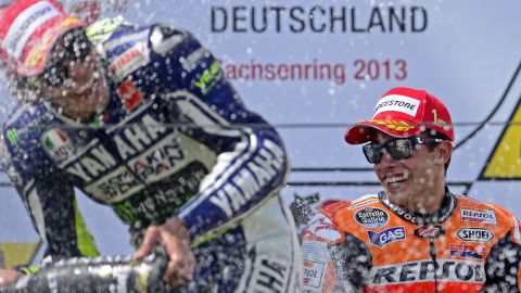 Marc Marquez, right, won the German Grand Prix to take the lead in the MotoGP standings. 