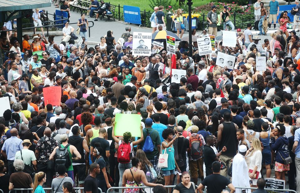 People gather at a rally honoring Trayvon Martin at Union Square in New York on July 14.