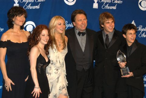 John Ritter, center -- shown here with "8 Simple Rules" cast mates (from left) Katey Sagal, Amy Davidson, Kaley Cuoco, Billy Aaron Brown and Martin Spanjers -- died of an aortic dissection at the height of the show in 2003. His character also died on the show and two additional cast members, David Spade and James Garner, were cast after a hiatus.