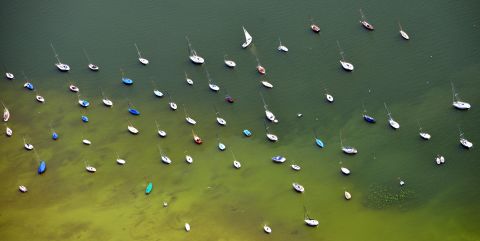 Sailboats dot Lake Ammersee, near Herrsching, in southern Germany on Saturday, July 13.