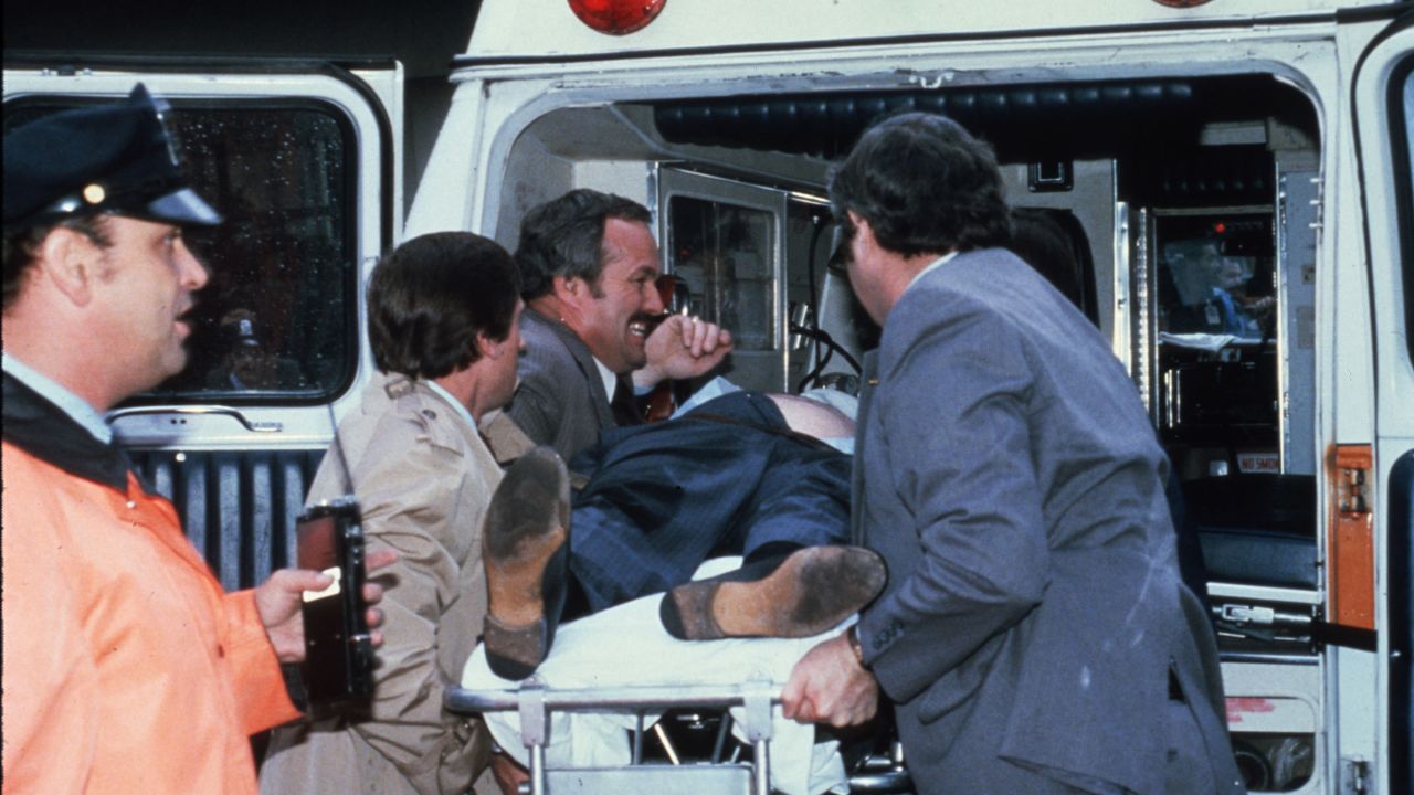 Brady is placed into an ambulance after the shooting. He suffered severe brain trauma and was unable to return to his post at the White House.