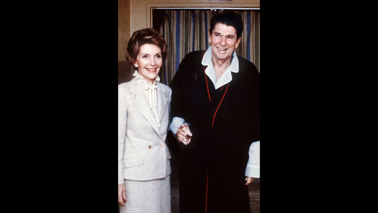 Four days after the assassination attempt, Reagan and the first lady pose for a photo inside the George Washington University Hospital.