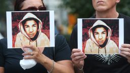 People hold photos of Trayvon Martin at a rally honoring Martin at Union Square in Manhattan on July 14, 2013 in New York City. George Zimmerman was acquitted of all charges in the shooting death of Martin July 13 and many protesters questioned the verdict.