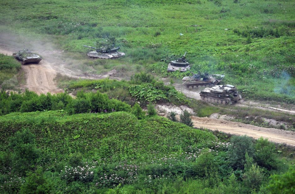 Russian tanks move across Sakhalin Island on July 16.
