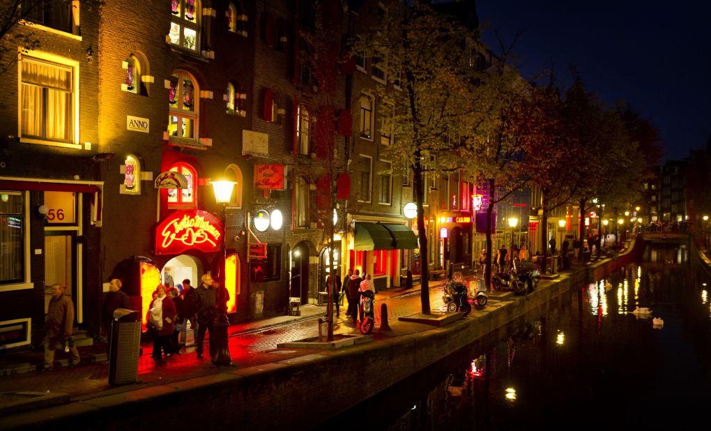 Whether just fascinated or ready to partake, a huge share of tourists are also drawn by the legal sale of sex in Amsterdam's red-light district, known as De Wallen. 