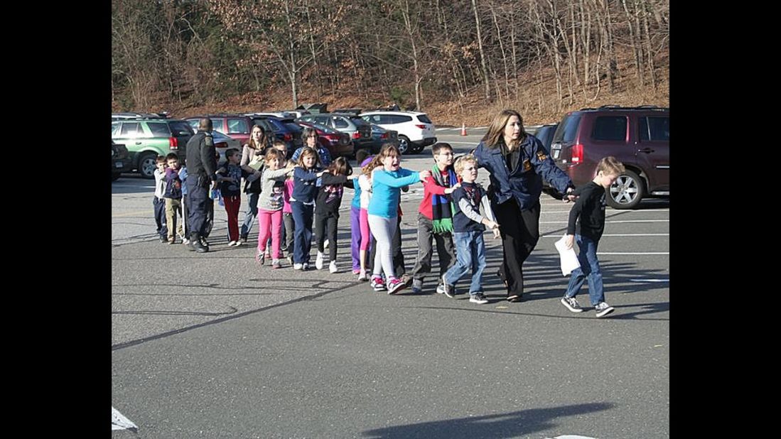Connecticut State Police evacuate <a href="http://www.cnn.com/2012/12/14/us/connecticut-school-shooting/index.html" target="_blank">Sandy Hook Elementary School</a> in Newtown, Connecticut, in December 2012. Adam Lanza opened fire in the school, killing 20 children and six adults before killing himself. Police said he also shot and killed his mother in her Newtown home. 