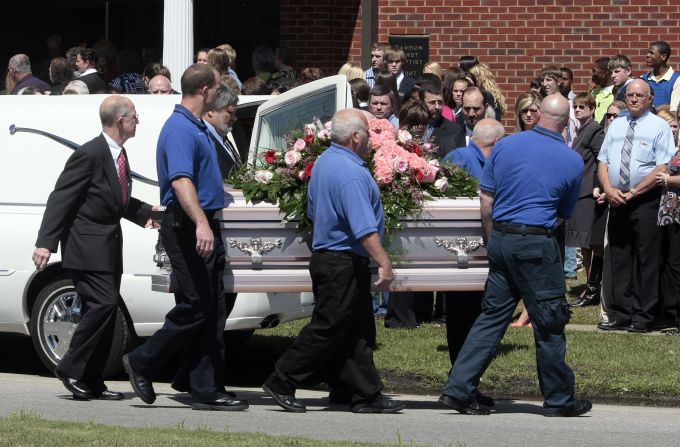 Pallbearers carry a casket of one of <a href="index.php?page=&url=http%3A%2F%2Fwww.cnn.com%2F2009%2FCRIME%2F03%2F11%2Falabama.shooting.timeline%2Findex.html%3Firef%3Dallsearch" target="_blank">Michael McLendon's</a> 10 victims. McLendon shot and killed his mother in her Kingston, Alabama, home, before shooting his aunt, uncle, grandparents and five more people. He shot and killed himself in Samson, Alabama, in March 2009.