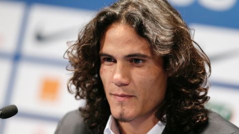 Edinson Cavani has signed for Paris Saint-Germain in a record deal for a French club.