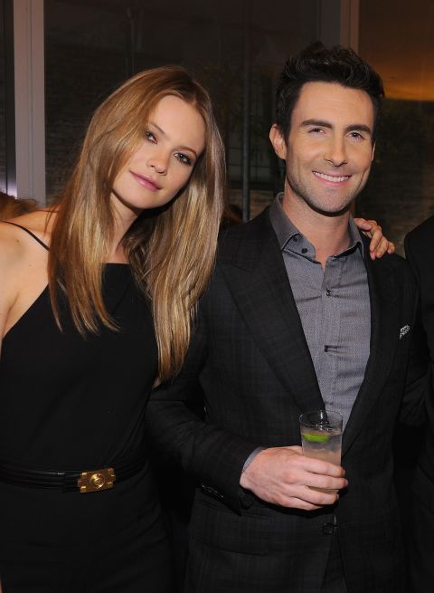 Model Behati Prinsloo is now married to the "Sexiest Man Alive," Adam Levine. Here's a look at the "sexy" singer through the years: