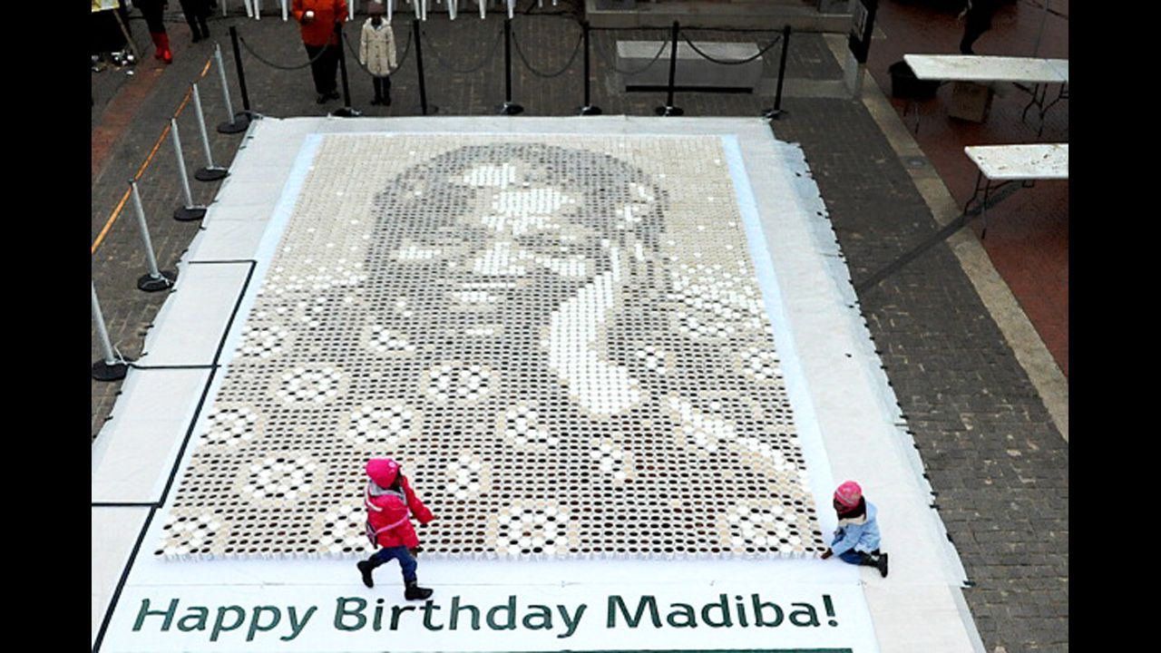 <strong>SOUTH AFRICA:</strong> A giant mosaic of Mandela made from 5,000 cups of coffee is displayed at Constitutional Hill in Johannesburg.