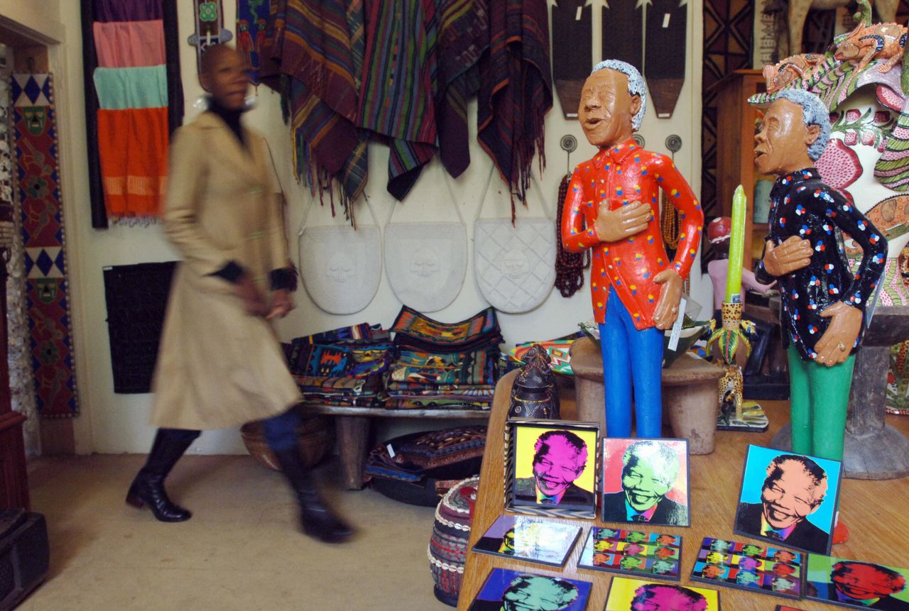 <strong>SOUTH AFRICA:</strong> Ceramic statues of Mandela are seen in a shop in Johannesburg. 