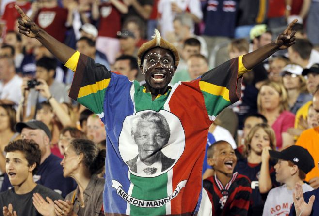 <strong>UNITED STATES: </strong>A fan wearing the colors of South Africa and a portrait of Mandela cheers in the second half of a soccer match between the U.S. and the Czech Republic in East Hartford, Connecticut.