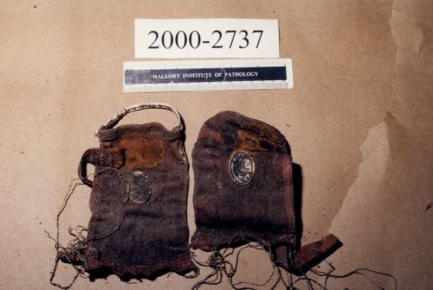 The remains of Thomas King, former member of the Winter Hill Gang, were found in late 2000 and included these driving gloves, a bulletproof vest, a navy suit, and a claddagh ring. Martorano, one of Bulger's hitmen, testified that he himself had shot King in the back of the head.