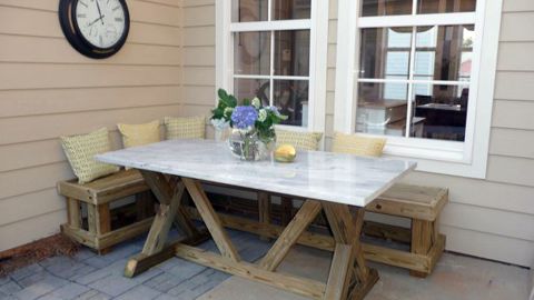 <a href="http://ireport.cnn.com/docs/DOC-1003865">Rina Norwood</a> enjoys dining al fresco in the corner of her patio where she built a banquette and used salvage marble as a table top.