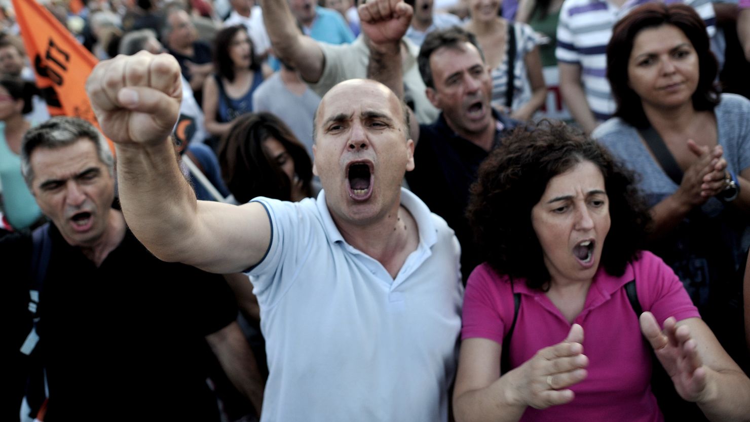 Municipality employees demonstrate in front of the Greek Parliament during a vote on more austerity measures.