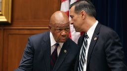 House Oversight Committee Chairman Darrell Issa, R-California, right, talks with ranking Democratic member Elijah Cummings of Maryland before what turned out to be a contentious hearing on the IRS targeting of political groups.