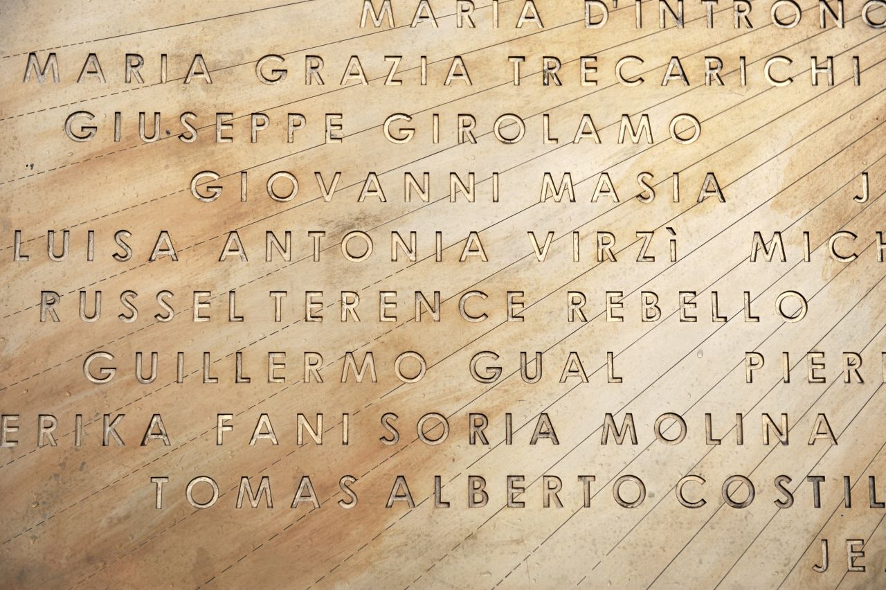 A commemorative plaque honoring the victims of the cruise disaster is unveiled in Giglio on January 14, 2013.