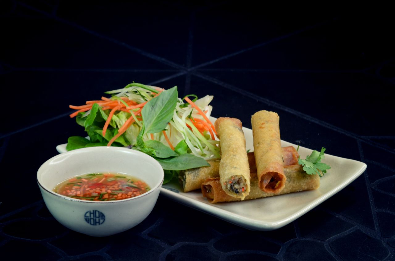 <strong>Chom Chom in Hong Kong </strong>didn't garner any stars in this year's Michelin guide, but it's still an incredible value for gourmet meals. Click on for more examples from around the world. <br /><strong>Chef: </strong>Peter Cuong Franklin.<br /><strong>Cuisine: </strong>Modern Vietnamese street food, with French techniques and presentation applied to classics like charcoal-grilled squid and bun cha pork. This casual eatery is inspired by Hanoi's bia hoi culture of sipping draft beer on street corners.