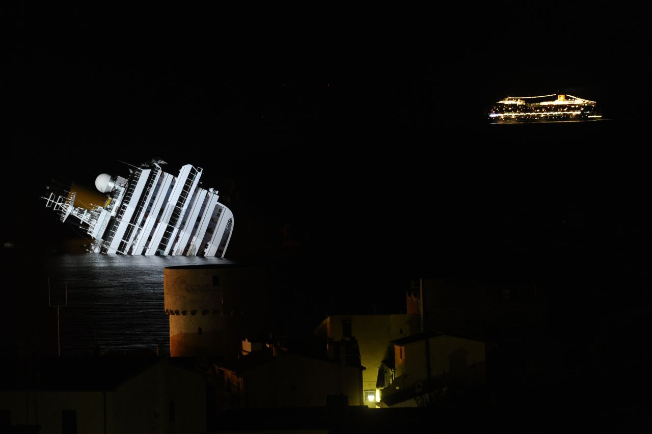 The Costa Serena, the sister ship of the wrecked Costa Concordia, passes by on January 18, 2012.